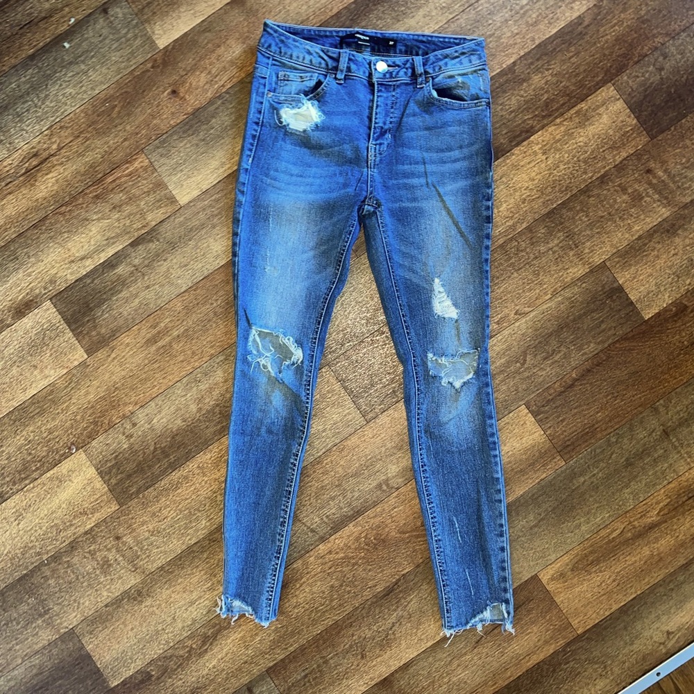 Harper destructed skinny jean with frayed hems size 27 color cool blue.